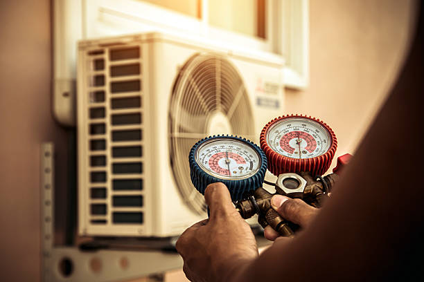 Professional Air Conditioning Service technician working in Pinellas Park, FL
